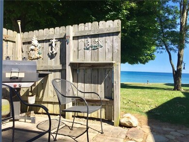 Here's a view of the stone patio with privacy fenc