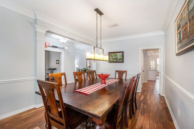 Very spacious with crown molding and chair rail.