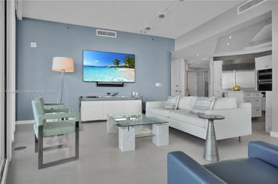 Sophisticated coastal living, panoramic glass.