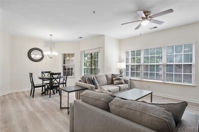 Family room view to dining area and door to balcon