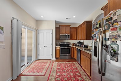 Kitchen featuring appliances with stainless steel 
