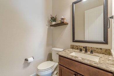 Bathroom with vanity and toilet