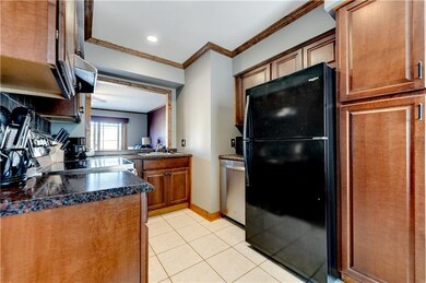 Attractive kitchen with quartz counter tops.