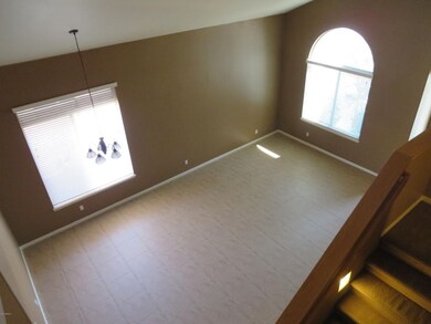 VIEW OF FORMAL LIVING & DINING ROOM