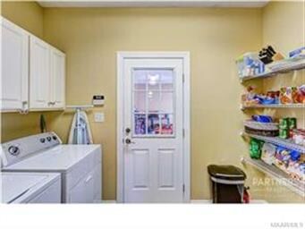 Just off of the eat-in is the laundry room and ENO