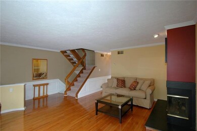 Stylish living room with gleaming hardwood floorin