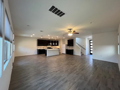Unfurnished living room featuring healthy amount