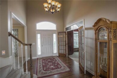 Front foyer. Office on the right with French doors