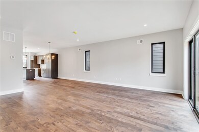Additional view of the homes living room that open