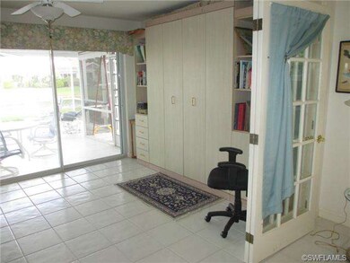 Den area has built in Murphy Bed system