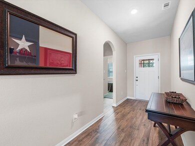 Entry hall greets your guests with a custom Craftsmen style front door