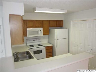 This home is move-in ready with fresh paint, new carpet, tile, dishwasher, range and microwave, as well as ceiling fans and light fixtures. The washer, dryer and refrigerator remain.