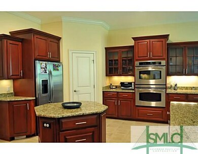 Kitchen. GOURMET kitchen with double ovens, cookto