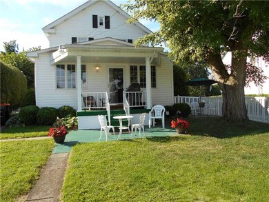 Exterior Back. Enjoy the covered porch with your m