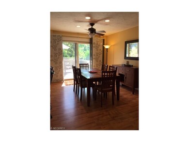 DINING AREA. SLIDING DOOR LEADS TO PRIVACY DECK