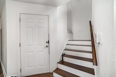 Stairway with wood finished floors