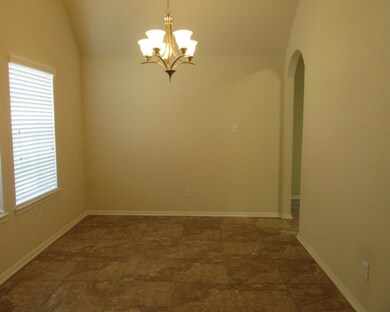 Formal dining room with nice light fixture