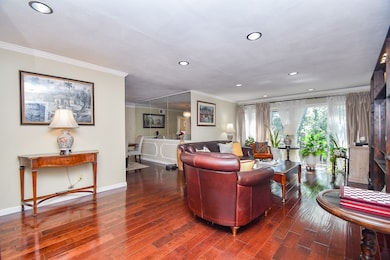 Large Spacious Family Room with Wood Floors and a
