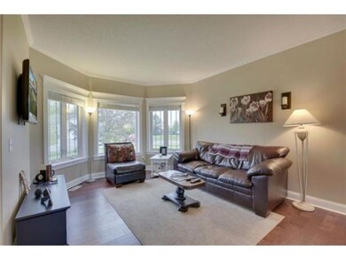 Relax in the spacious living room with bay window 