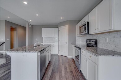 723 Gamma Grass Place, Raymore, MO 64083 - photo 7