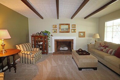 Brick front fireplace with mantel