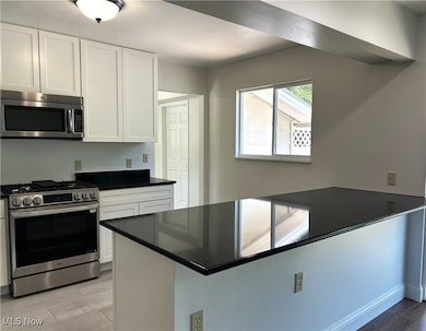 Breakfast Bar with Quartz countertops.