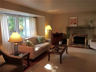 Stunning oversized multi-paned windows allow the s