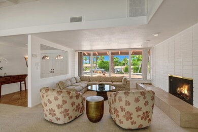 LIVING ROOM WITH FIREPLACE WALL TO ENTRY