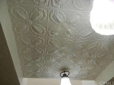 These are antique tin tiles.  The ceiling in the k