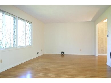 Living Room. Half a level up is your living room, 