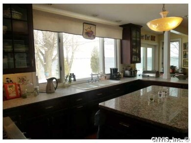 Kitchen Cherry cabinets, granite topped center isl