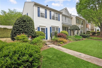 View of property with a front yard