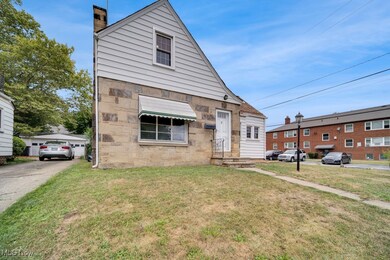 Bungalow-style home featuring a front lawn