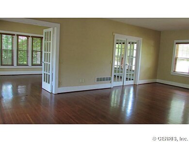 Living Room View of double entry to Family room