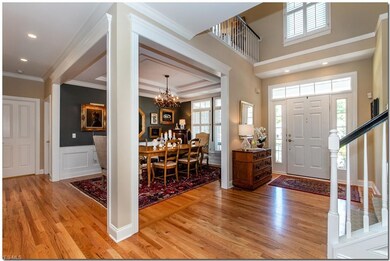 Beautiful hardwood floors, transom windows and cus