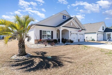 View of front facade featuring driveway and an att