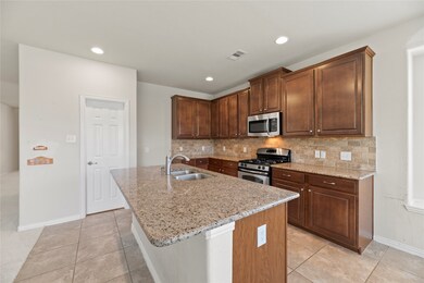 The Stunning granite island is made for entertaining. It allows for you to keep your guests immersed in conversation as you fulfill their belly wishes. Your dinner goals quickly become a reality.

