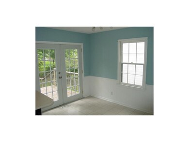 Large Dining room with french doors that opens to 