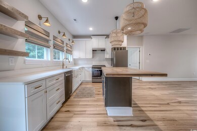 Kitchen featuring appliances with stainless steel 