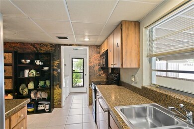 Kitchen to Laundry and backyard