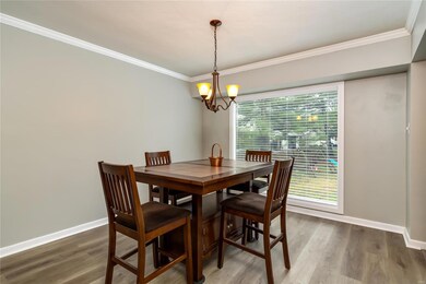 Dining room also has brand new vinyl flooring and tons of natural light.
