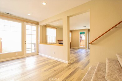 Spacious living room opens to Family Room; all new hardwood flooring, paint and carpeting upstairs.
