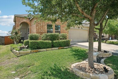Obstructed view of property featuring driveway, b