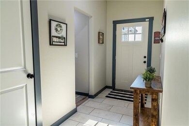 Entry, Coat closet, hall to secondary bedroom and 