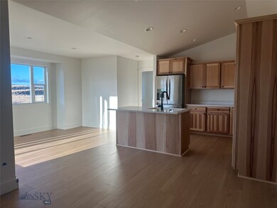 View of Kitchen and Dining room with large windows
