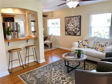Main home living room with hardwood floors.