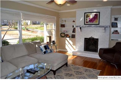 Natural light streams through to give the room a s