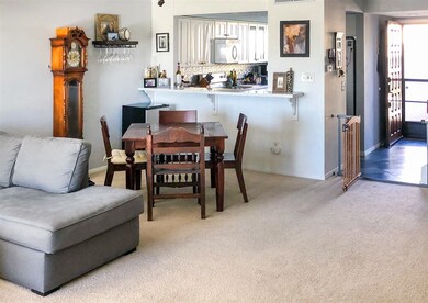 Great dining area between kitchen and living room.