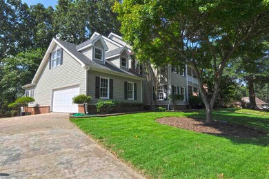 This home features a 2-car garage located to the s