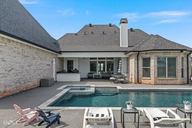 View of swimming pool with a patio and an in groun